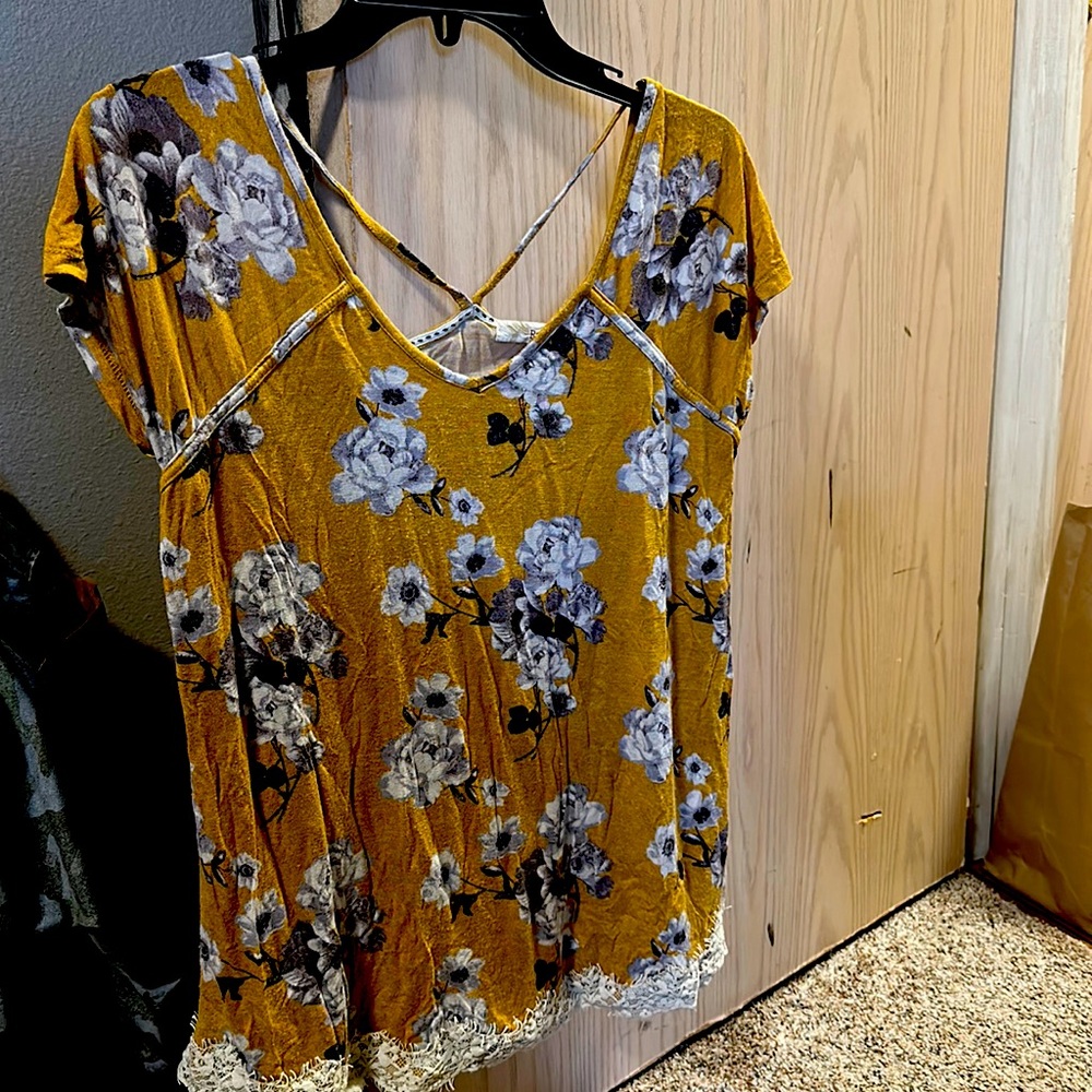 Open back floral shirt.